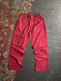 • red parachute pants